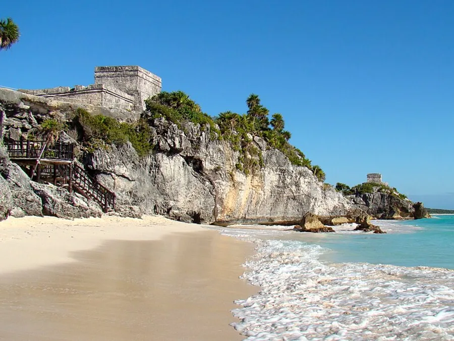 Mayan ruins over a Caribbean beach