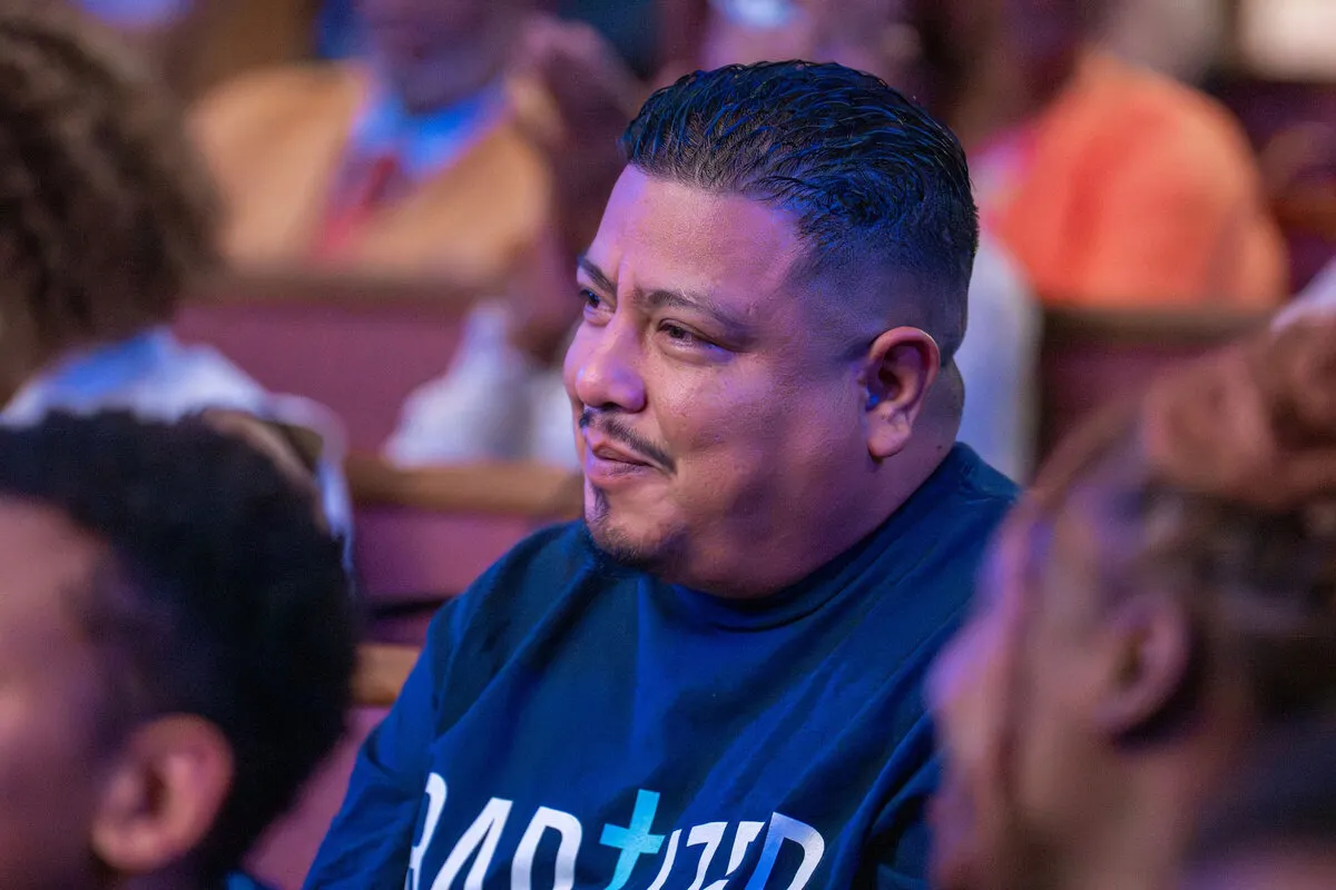 Congregation celebrating baptisms